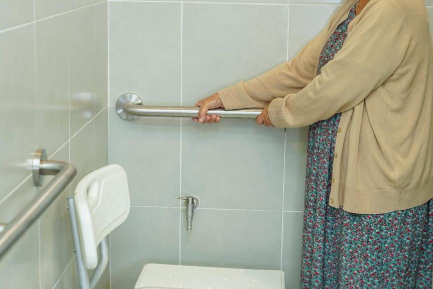 asian elderly old woman patient use toilet support rail bathroom handrail safety grab bar security nursing hospital